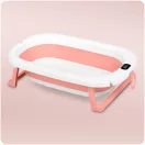 Utazó gyerekkád, Ricokids RK-287, fehér/rózsaszín, 85 x 45 cm, 45 l, összecsukható, hőmérővel, hőérzékelős dugóval, kivehető párnával, teherbírás: 45 kg, 0-3 éves korig
